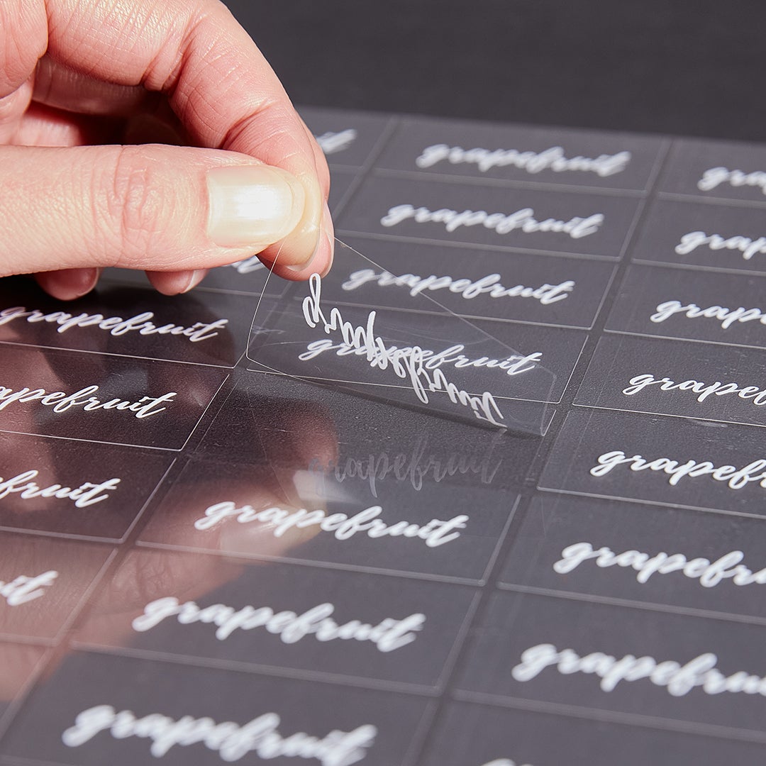 Labels, Grapefruit, 2 x 1 Inch, Water Resistant, Clear with White Font,1 - 100 COUNT