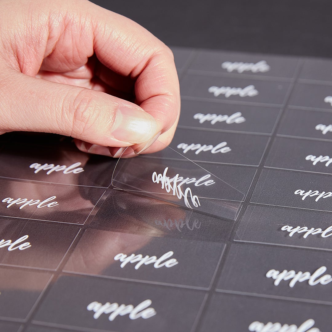 Labels, Apple, 2 x 1 Inch, Water Resistant, Clear with White Font,1 - 100 COUNT