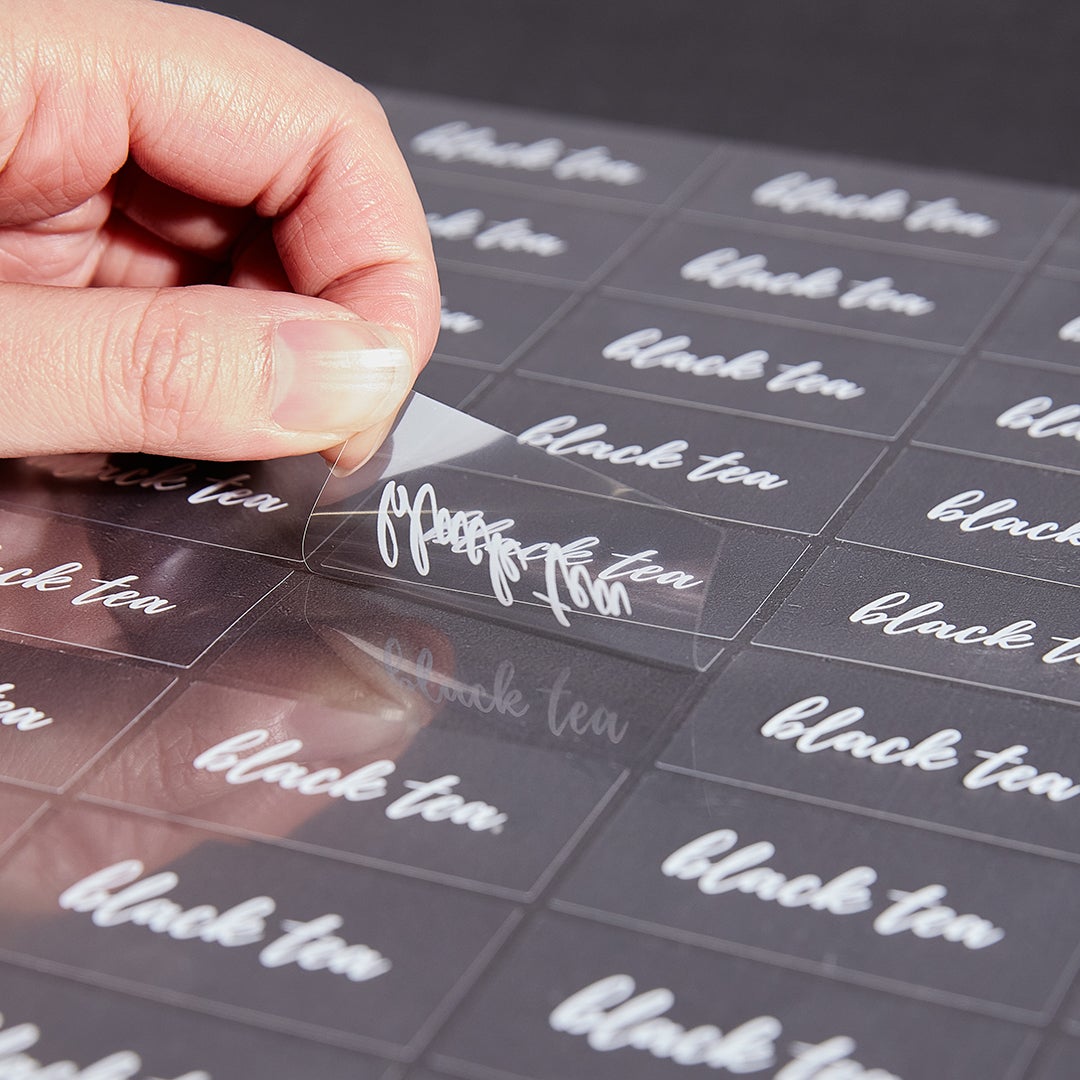 Labels, Black Tea, 2 x 1 Inch, Water Resistant, Clear with White Font,1 - 100 COUNT